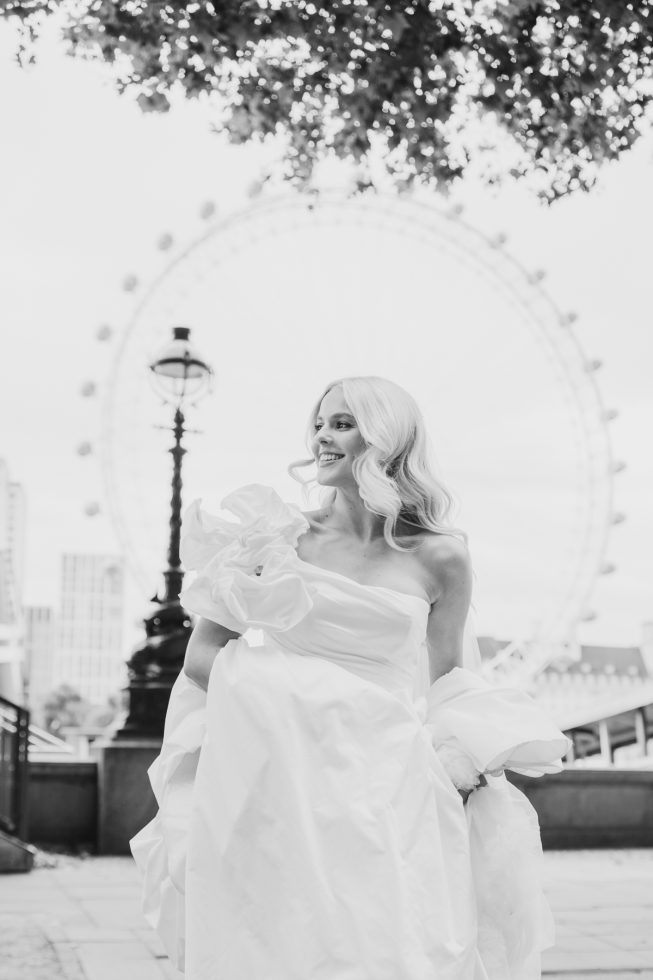 Bride running in wedding dress